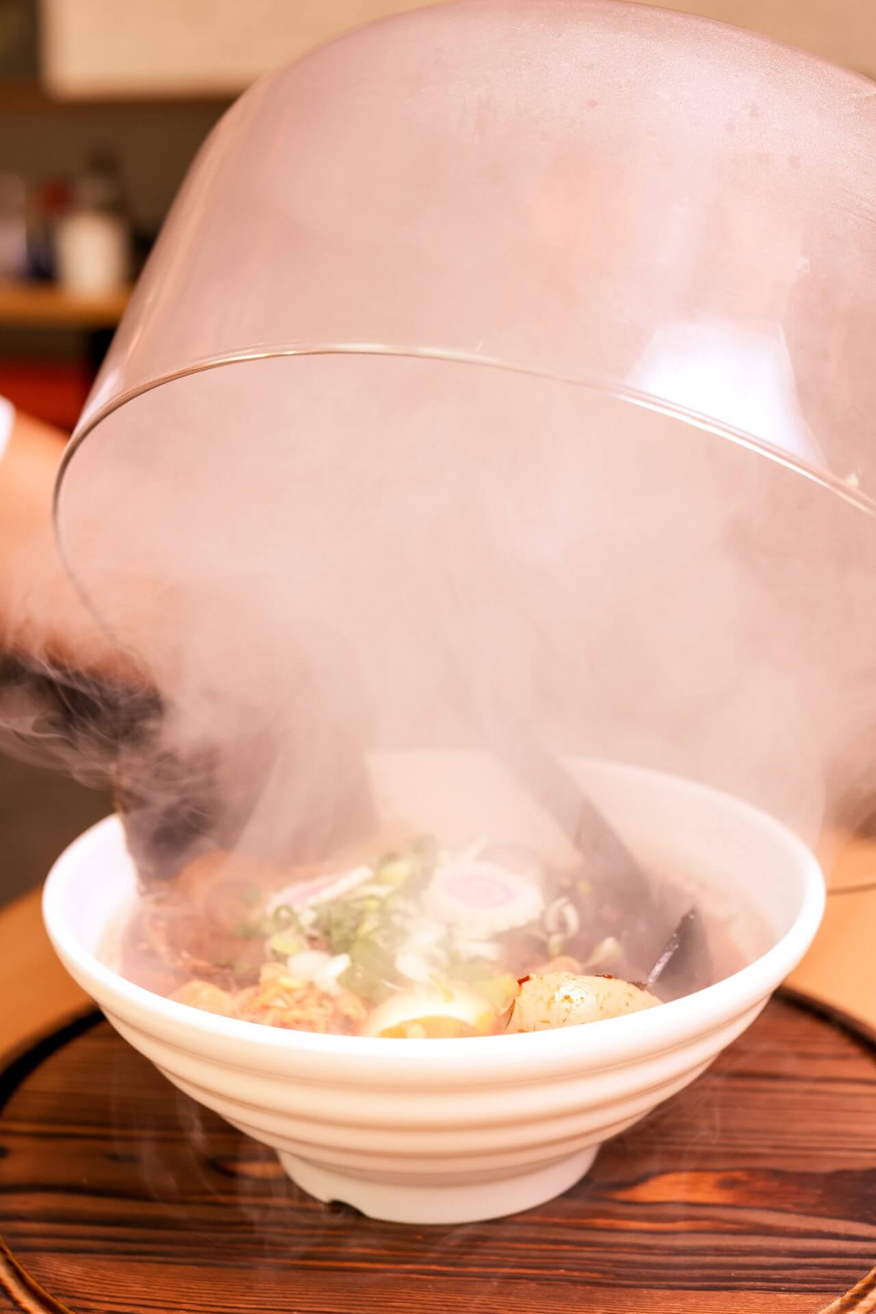 Steaming Hot Ramen with Umami-Rich Broth Our traditional broth is slow-cooked for 8 hours to extract deep, savory Umami flavors.