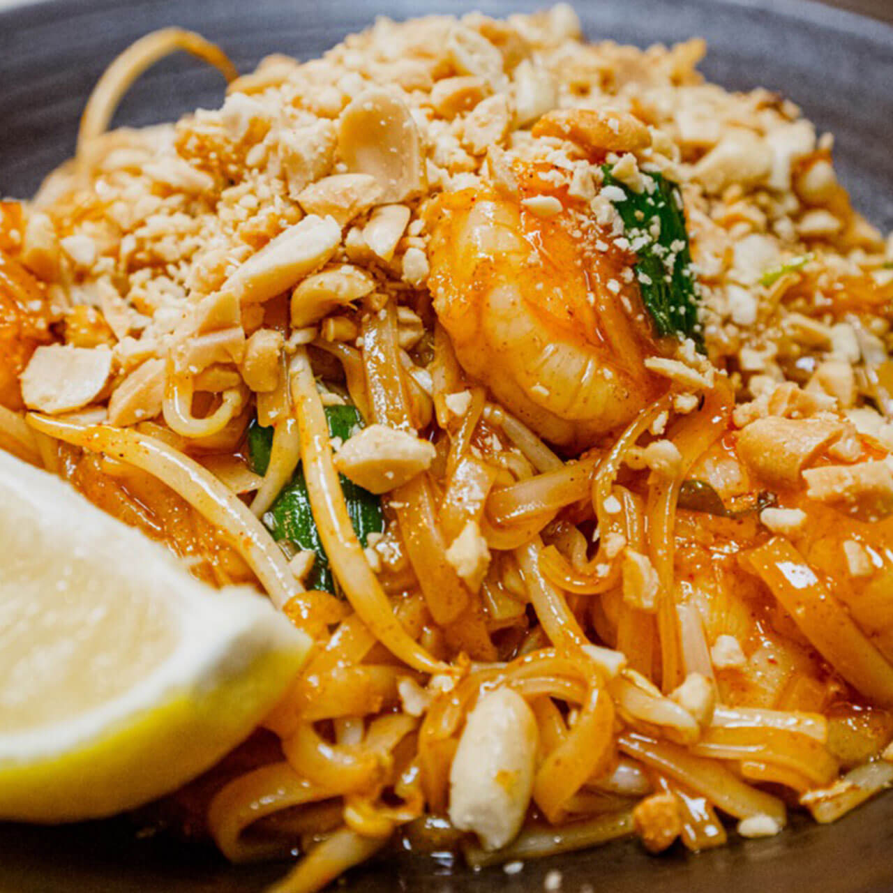 The most popular street food in Thailand, featuring rice noodles stir-fried with egg, mixed vegetable, and savory tamarind sauce.