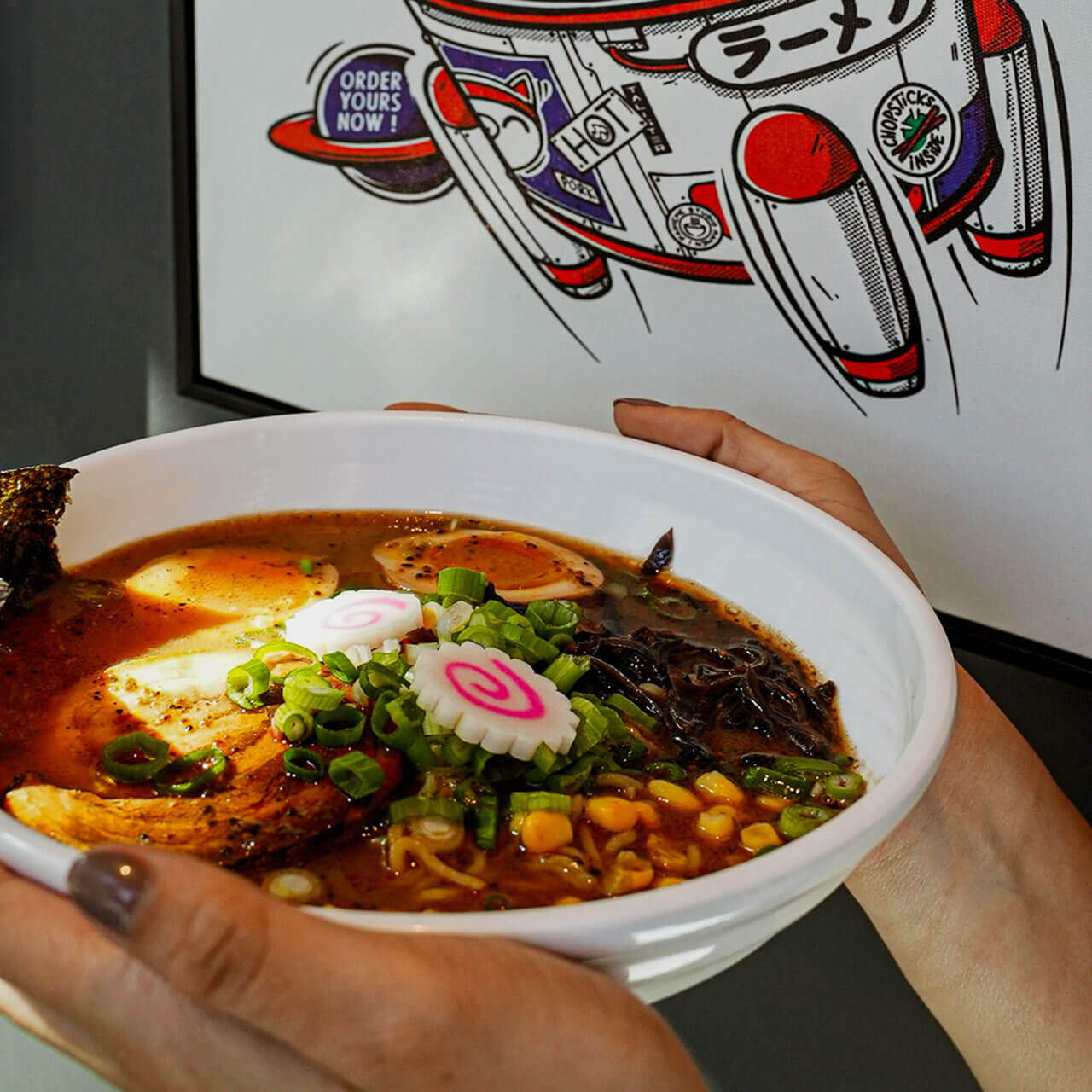 Hearty Miso or Tonkotsu ramen with a traditional 8-hour slow-cooked broth, featuring nitamago egg, scallions, and savory braised pork.