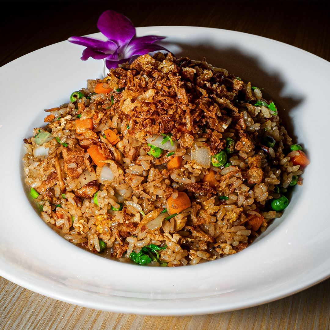 Mama Pork Fried Rice Flavorful Mama Pork Fried Rice with crispy shallots at this asian food spot.